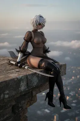 2B (YoRHa No.2 Type B) from NieR: Automata sitting on a stone ledge with a sword, wearing a gothic-lolita outfit and blindfold.