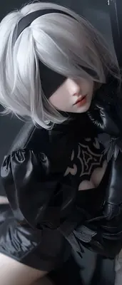 A digital illustration of 2B (YoRHa No.2 Type B) from NieR: Automata wearing a black gothic-lolita outfit with a blindfold and silver hair.