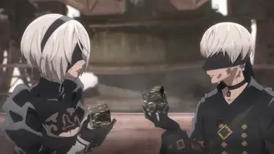 2B and 9S examining golden objects in an industrial setting.