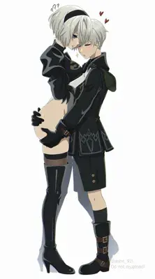 Couple in black and white clothes hugging