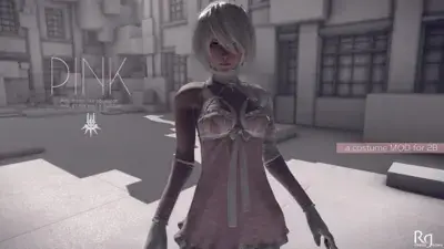 Girl in a pink dress standing in front of a building