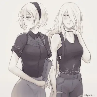 Two girls in black shirts and grey pants