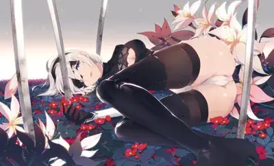 Woman in a black dress is surrounded by flowers