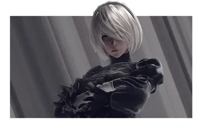 Woman with blonde hair and black clothes
